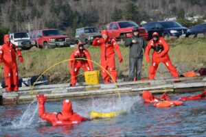 People in water safety train