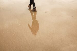 boots walking on sand