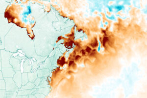 Map of Atlantic Ocean and US East Coast with dark red and orange colors near the coast and light blue off shore to indicate marine heatwaves near shore.