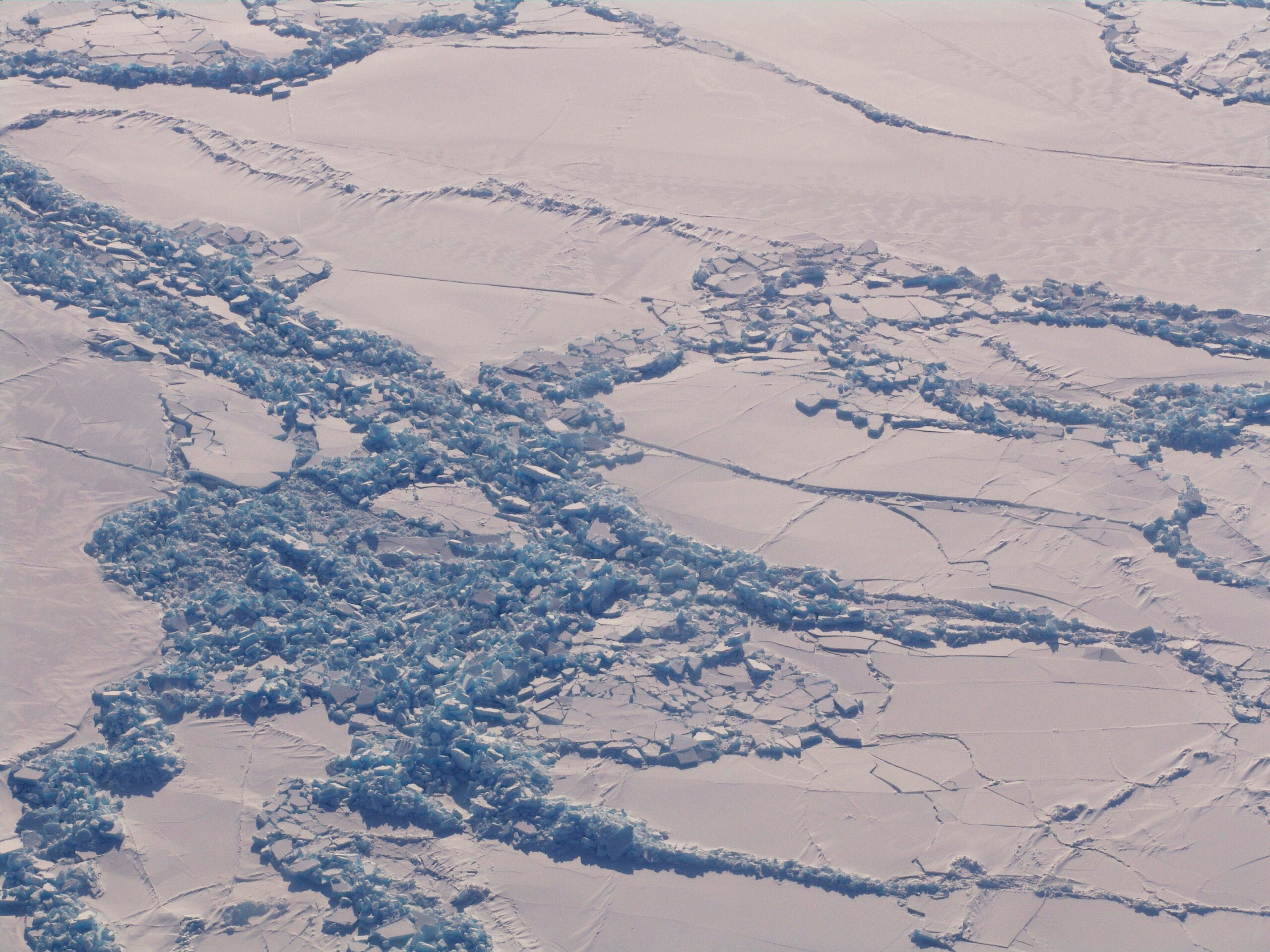 sea ice sheets pushing into one another creating pressure ridges